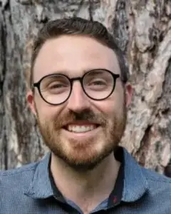 benjamin-macmillan-psychotherapist-qualifying-smiling-man with beard and glasses-therapist-Brantford