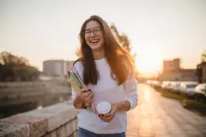 website-teen-girl-with-notebooks-and-coffee-