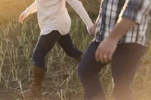 couples-counselling-walking-by-field